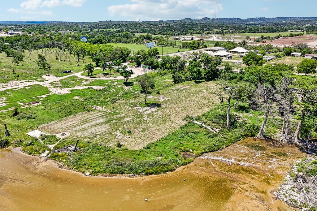 5953 Highway 27 Center Point, TX 78010 - Photo 18 of 21 a view of a lake with a city