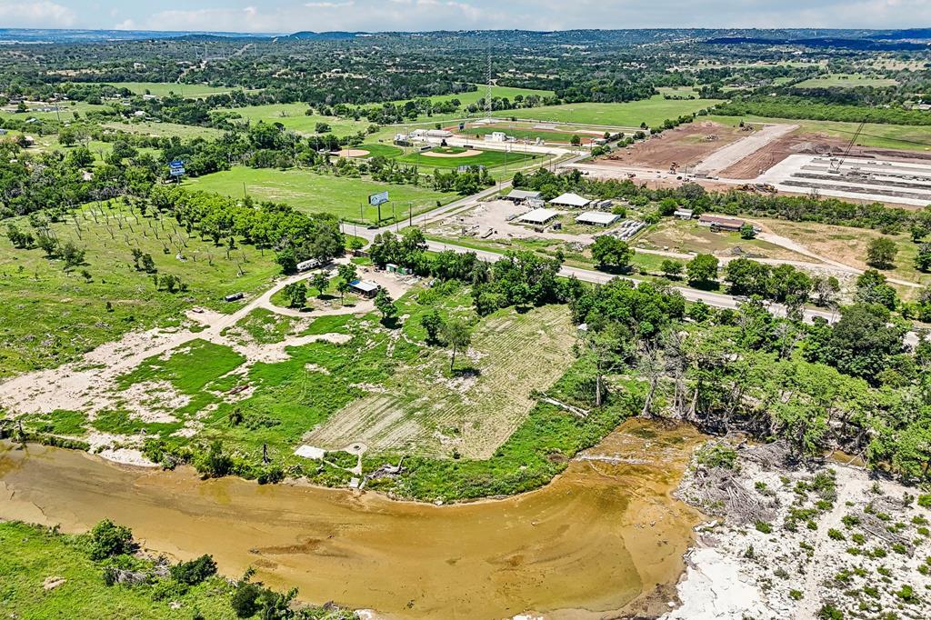 5953 Highway 27 Center Point, TX 78010 - Photo 2 of 21 a view of a lake with a park