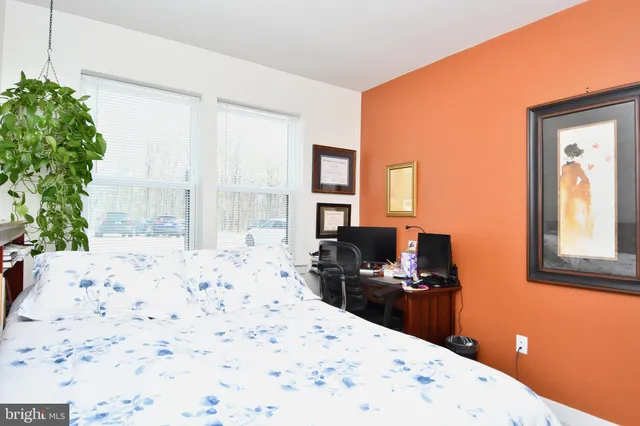 a kitchen with a refrigerator and a stove