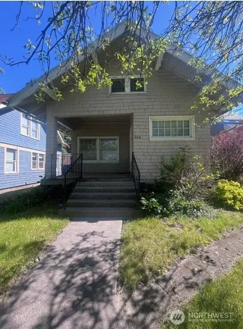 a house view with a garden space