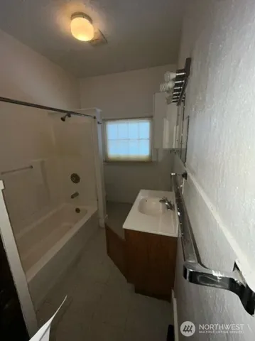 a view of a hallway with windows