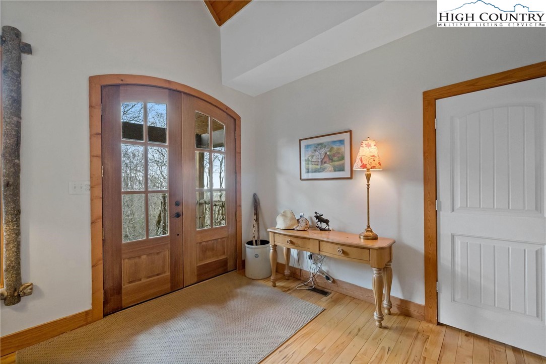 140 Spruce Hollow Road Beech Mountain, NC 28604 - Photo 23 of 50 a room with furniture and wooden floor