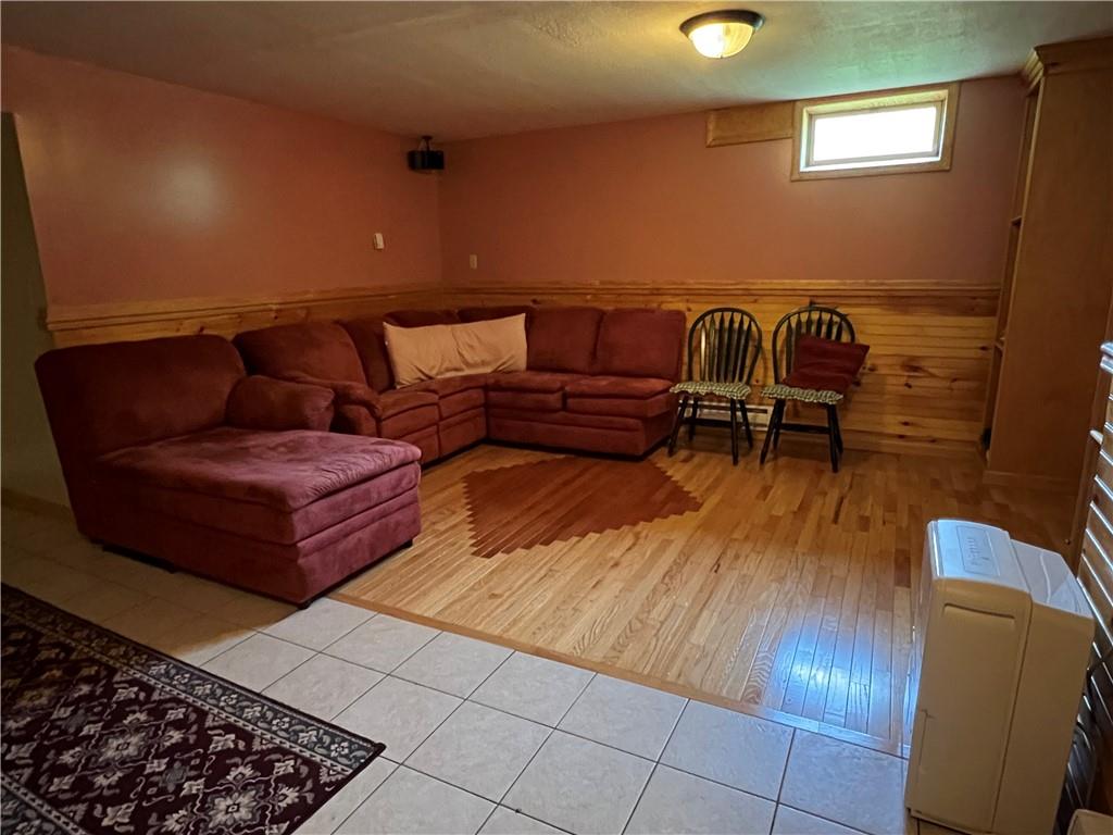 200 Smith Valley Road Slippery Rock, PA 16057 - Photo 21 of 24 a living room with a couch and a coffee table