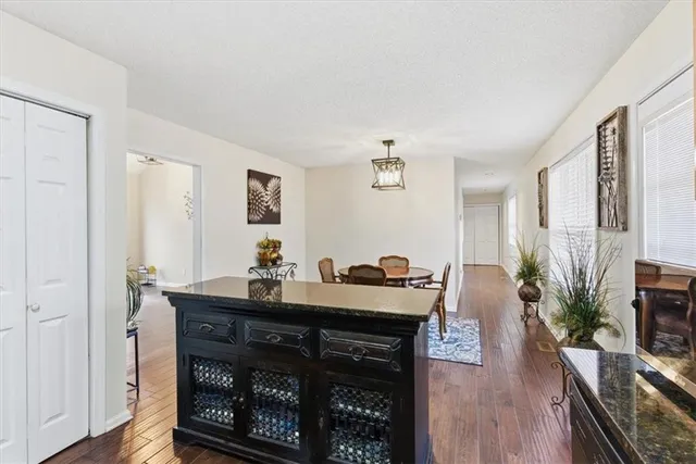 a view of a livingroom with furniture and wooden floor