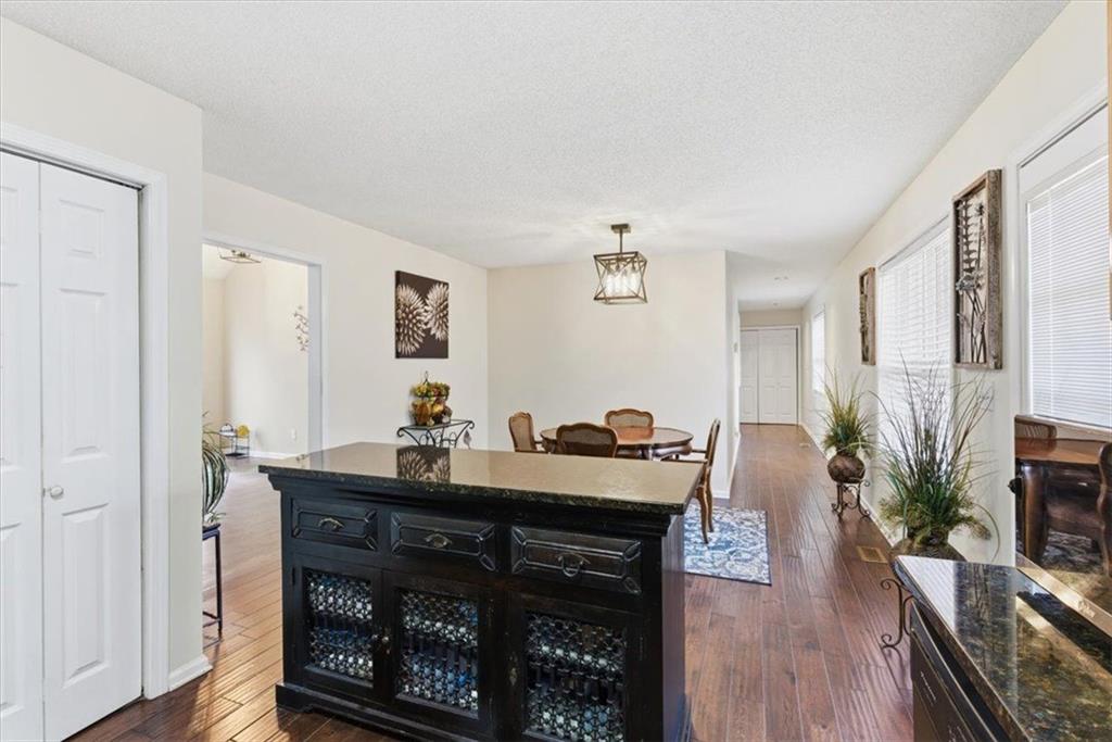 127 Prince Albert Court Southwest Calhoun, GA 30701 - Photo 15 of 50 a view of a livingroom with furniture and wooden floor
