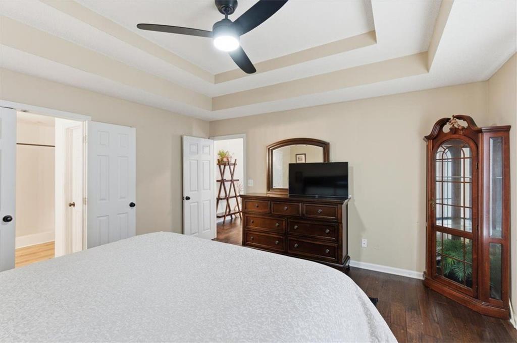 127 Prince Albert Court Southwest Calhoun, GA 30701 - Photo 22 of 50 a bedroom with a bed and a dresser