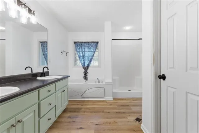 a view of bathroom with dual sinks