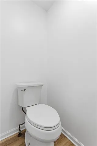 a bathroom with a toilet and a sink