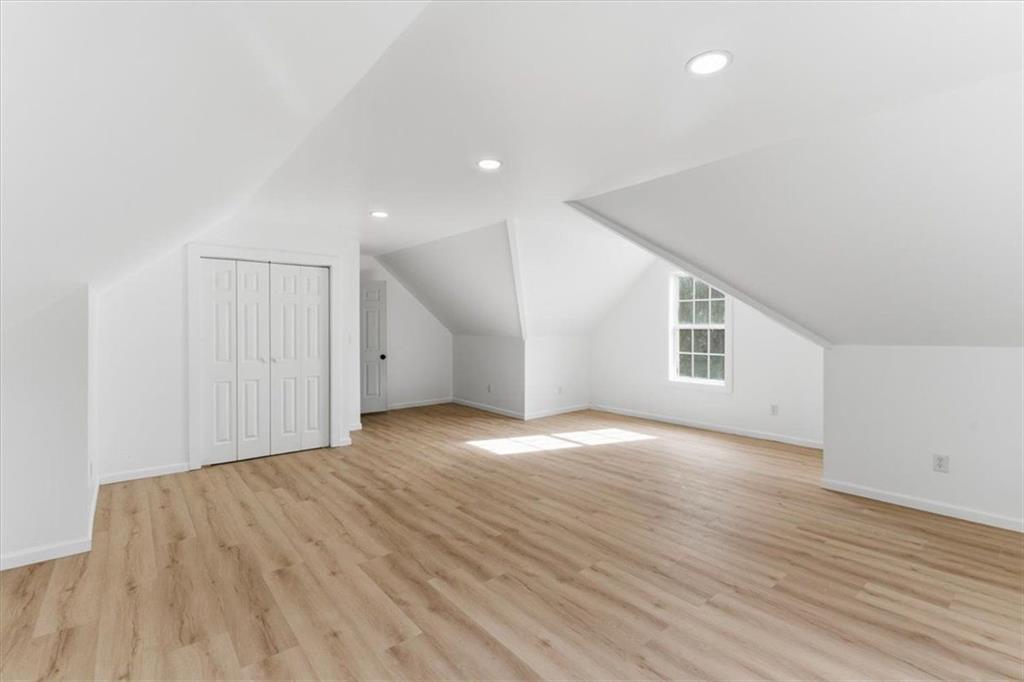 127 Prince Albert Court Southwest Calhoun, GA 30701 - Photo 33 of 50 an empty room with wooden floor and windows