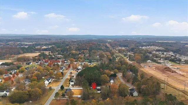 a view of house with a street
