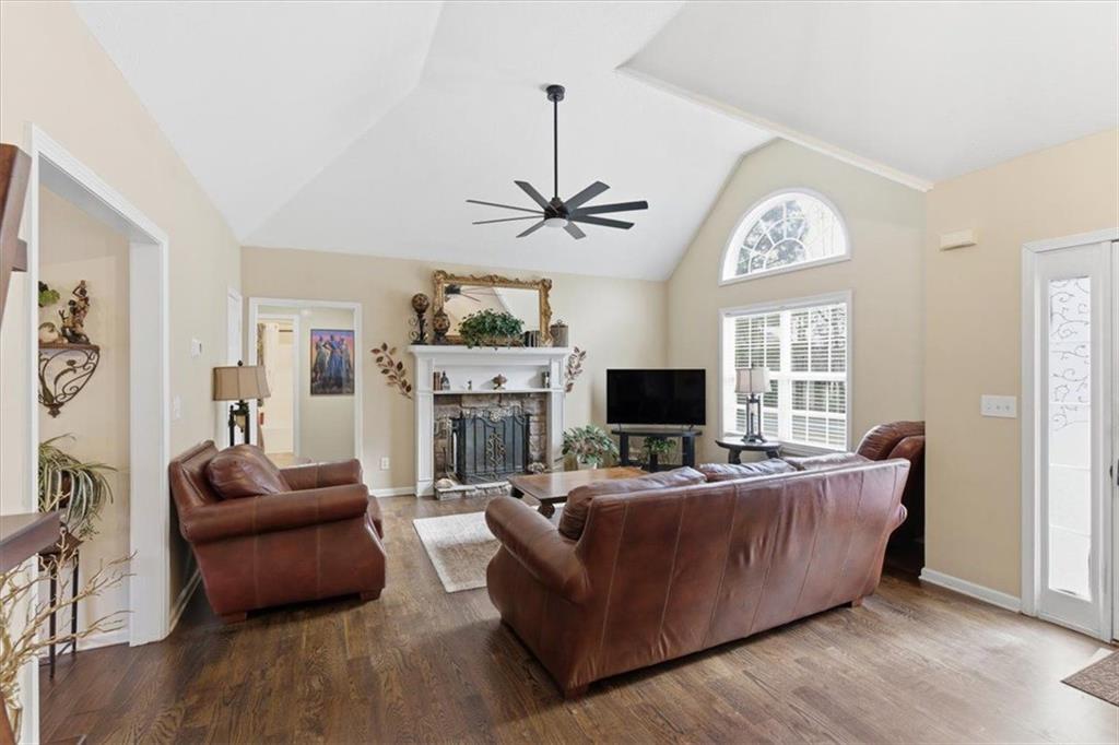 127 Prince Albert Court Southwest Calhoun, GA 30701 - Photo 7 of 50 a living room with furniture and a flat screen tv