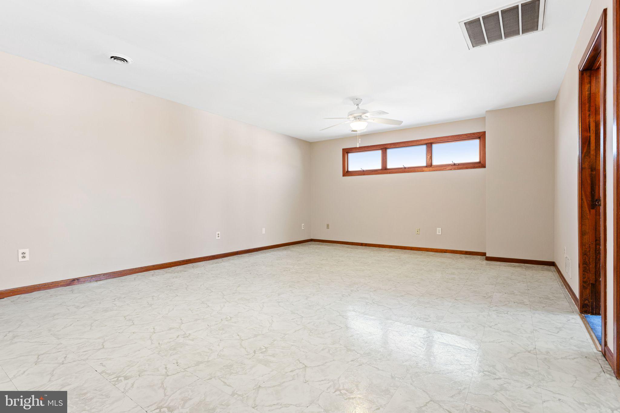 2623 Knights Road Bensalem, PA 19020 - Photo 31 of 50 an empty room with windows & cabinet