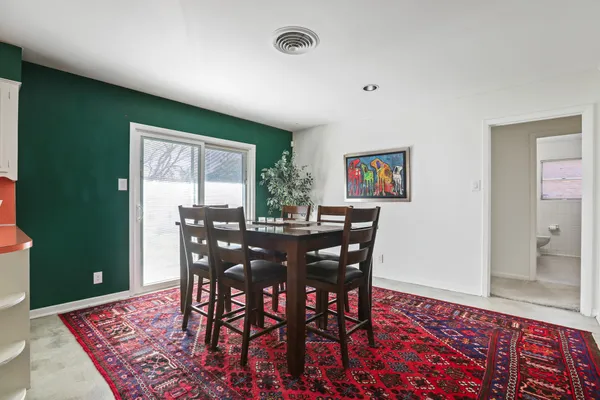 a view of a dining room with furniture