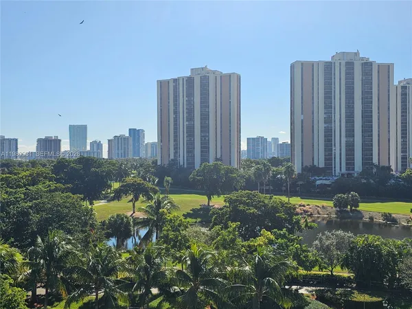 a view of a city with tall buildings