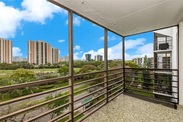 a view of a building from a balcony