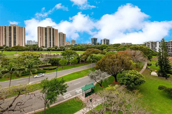 a view of a city with tall buildings
