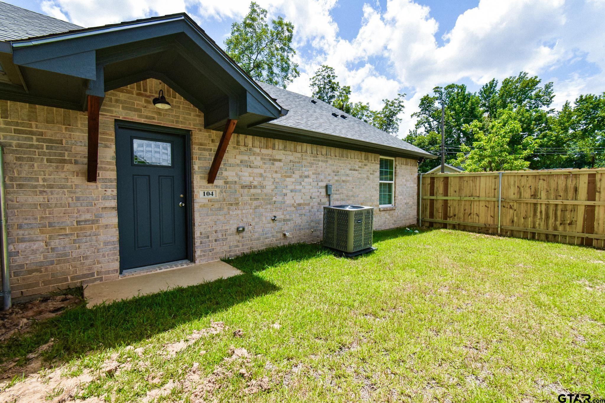 1417 East Earle Street Tyler, TX 75702 - Photo 30 of 31 a front view of a house with garden
