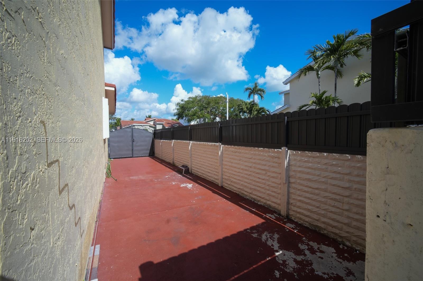 8568 Southwest 211th Terrace, Unit 8576 Cutler Bay, FL 33189 - Photo 22 of 26 a view of a balcony