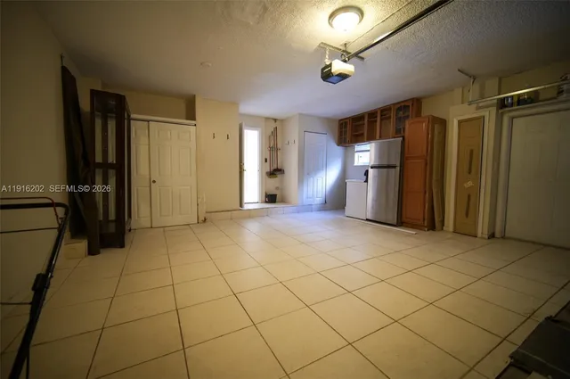 a view of a livingroom with a furniture and a ceiling fan
