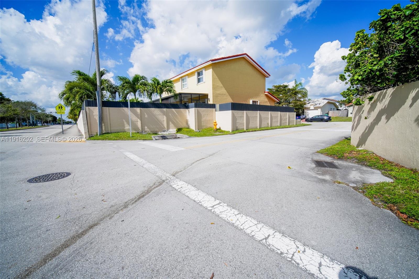 8568 Southwest 211th Terrace, Unit 8576 Cutler Bay, FL 33189 - Photo 26 of 26 a view of outdoor space yard and front view of a house