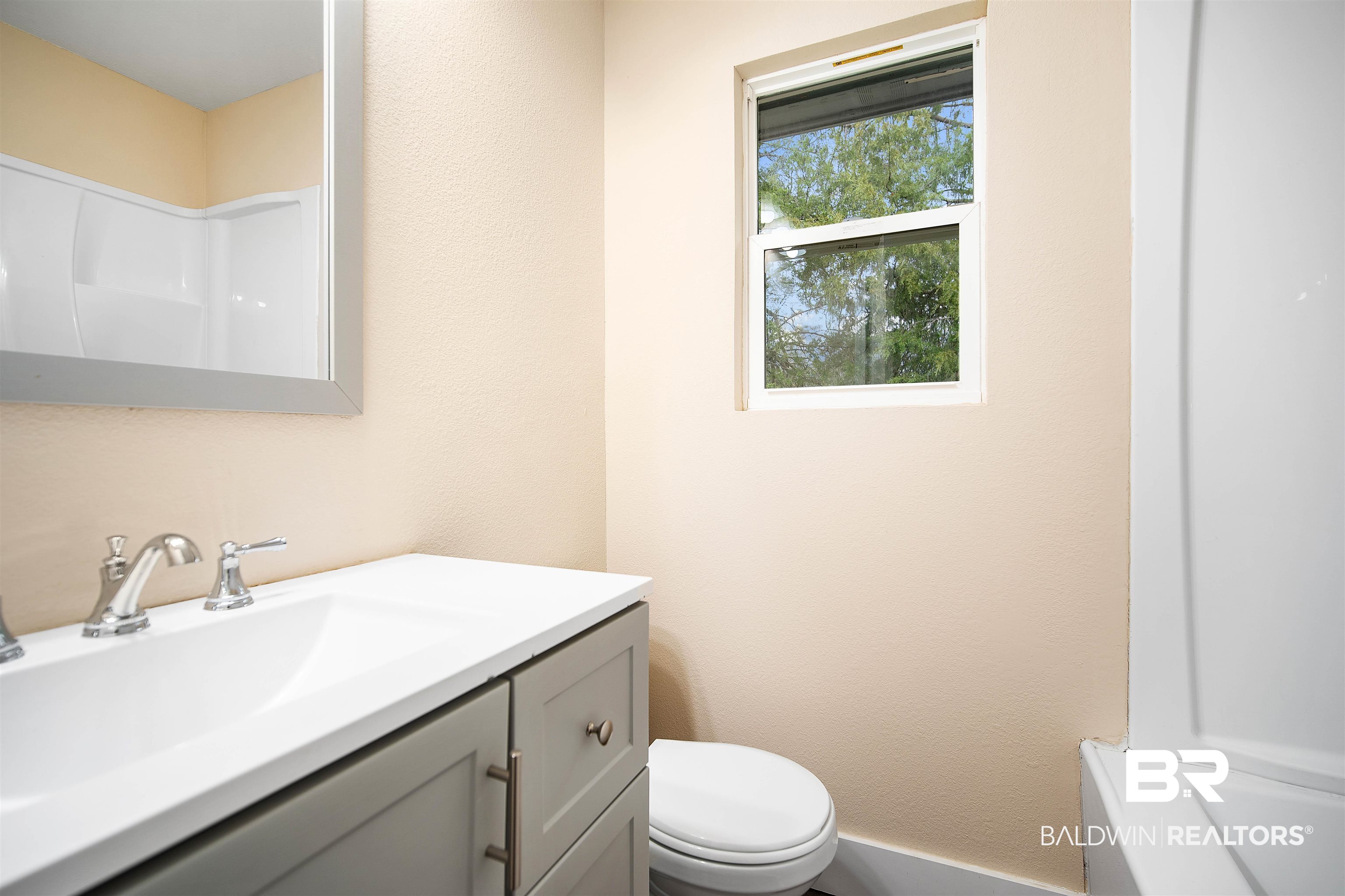 2119 Autrey Avenue Eight Mile, AL 36613 - Photo 16 of 22 Bathroom with vanity and toilet