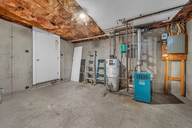a view of a room with wooden walls