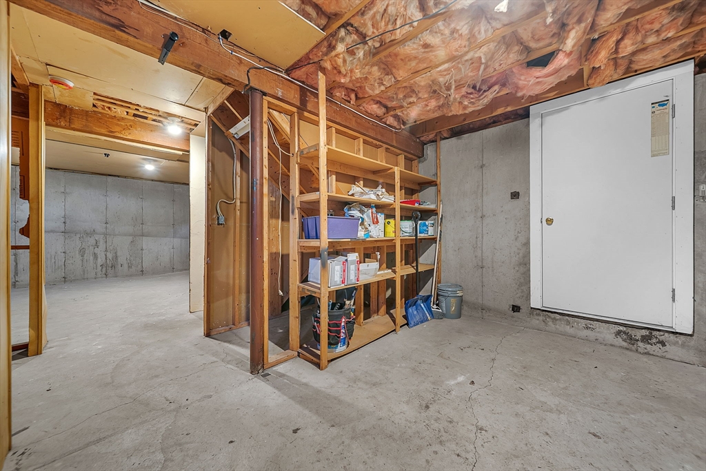 2 Cocci Way, Unit 2 Dedham, MA 02026 - Photo 28 of 30 a view of a room with wooden walls