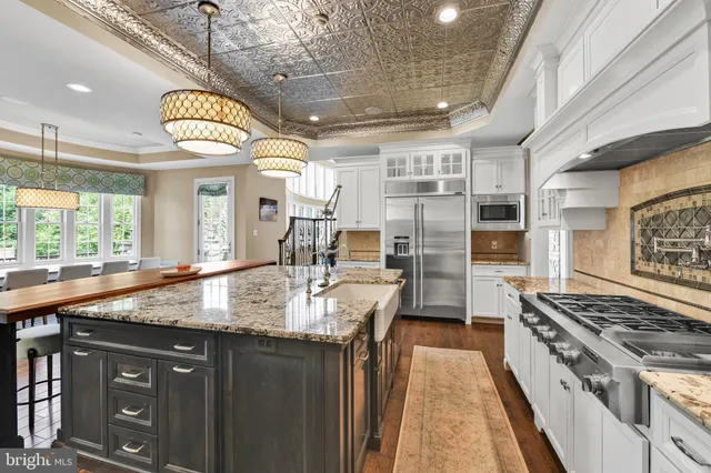 a living room with fireplace furniture and a flat screen tv