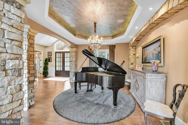 a view of a room with toys and a flat screen tv