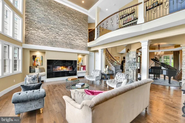 a bed room with furniture and a large window