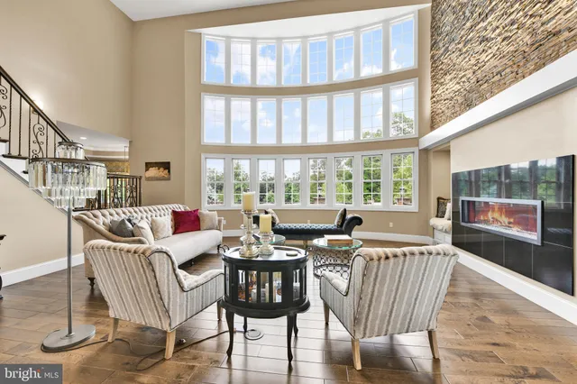 a room with a bed and a chandelier