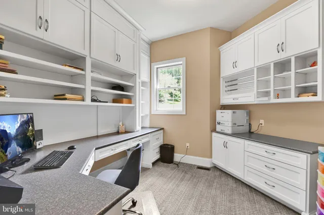 a kitchen with stainless steel appliances granite countertop a sink and stove