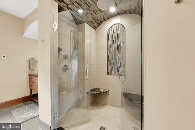 a view of a patio with table and chairs potted plants with wooden fence