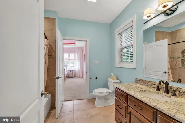 an aerial view of a house with a garden