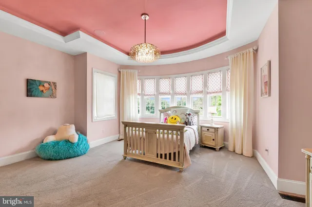 an aerial view of a house with outdoor space