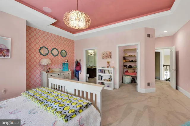 an aerial view of a house with outdoor space