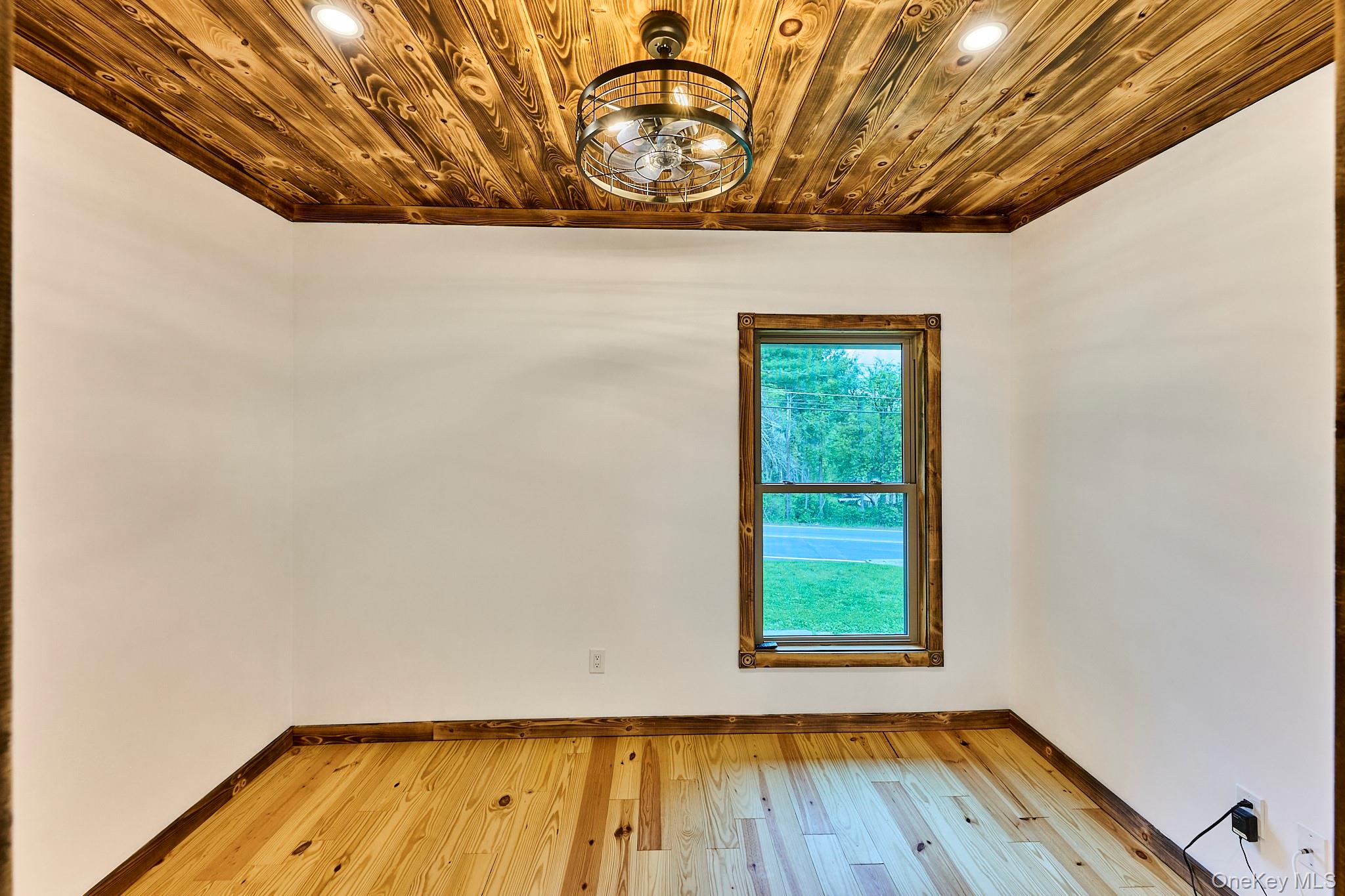 608 High Road Glen Spey, NY 12737 - Photo 26 of 37 a view of a room with wooden floor and window