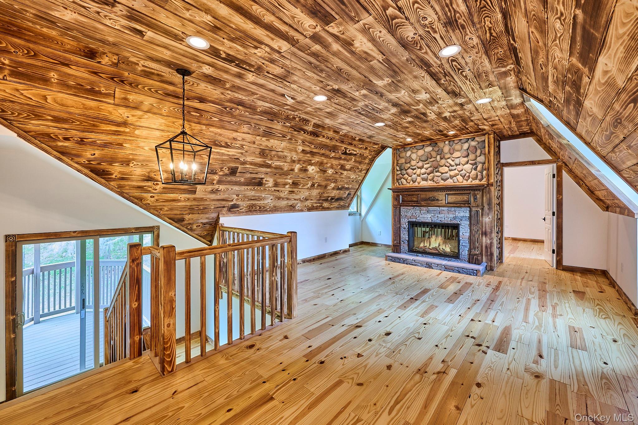 608 High Road Glen Spey, NY 12737 - Photo 30 of 37 a view of livingroom with wooden floor and fire pit