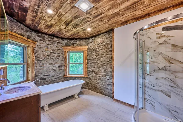 a bathroom with a shower and a toilet