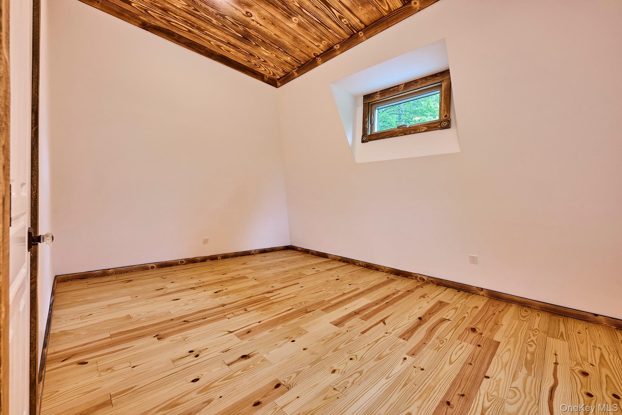 608 High Road Glen Spey, NY 12737 - Photo 35 of 37 a view of empty room with wooden floor