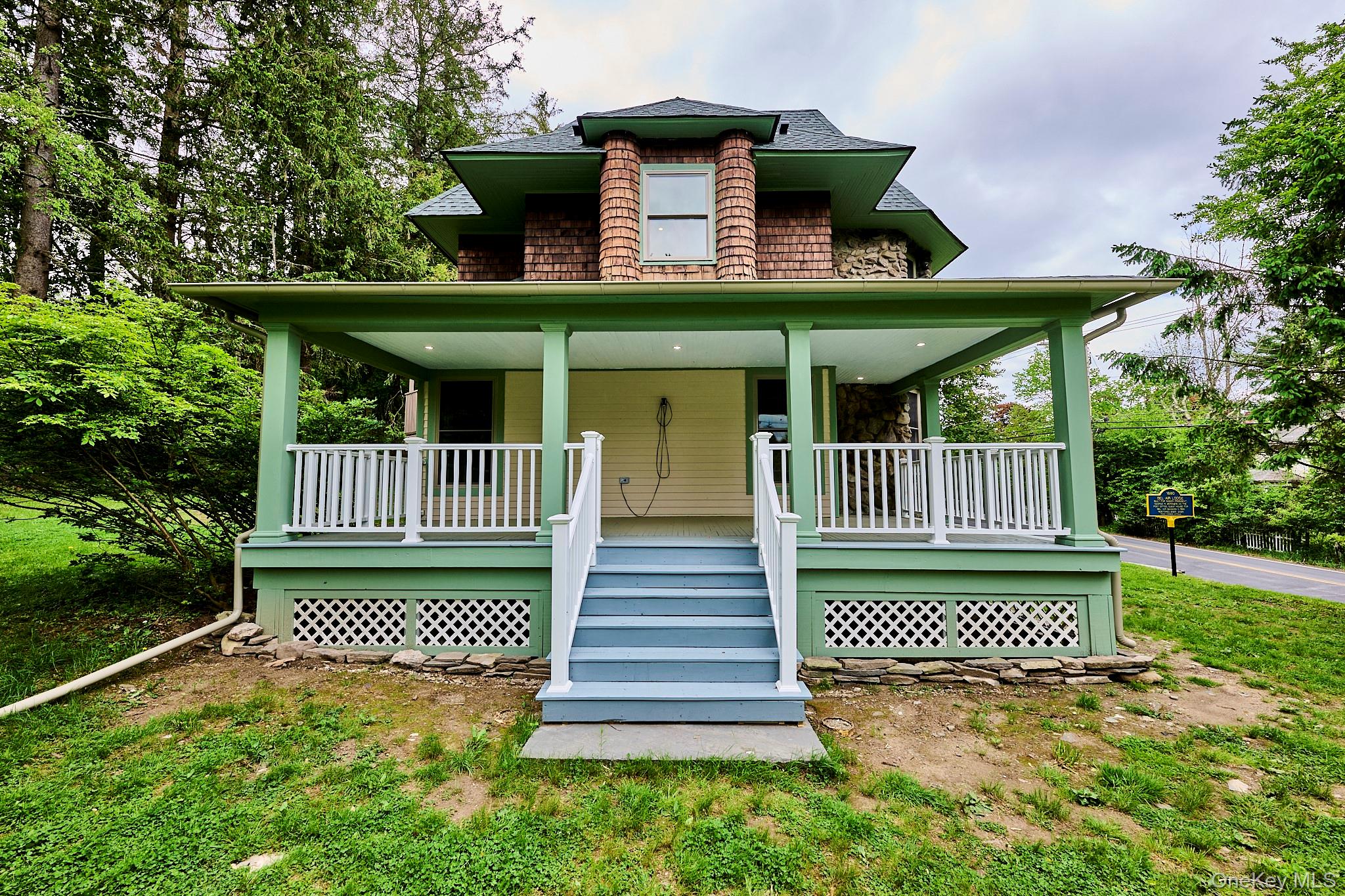 608 High Road Glen Spey, NY 12737 - Photo 5 of 37 a front view of a house with a yard