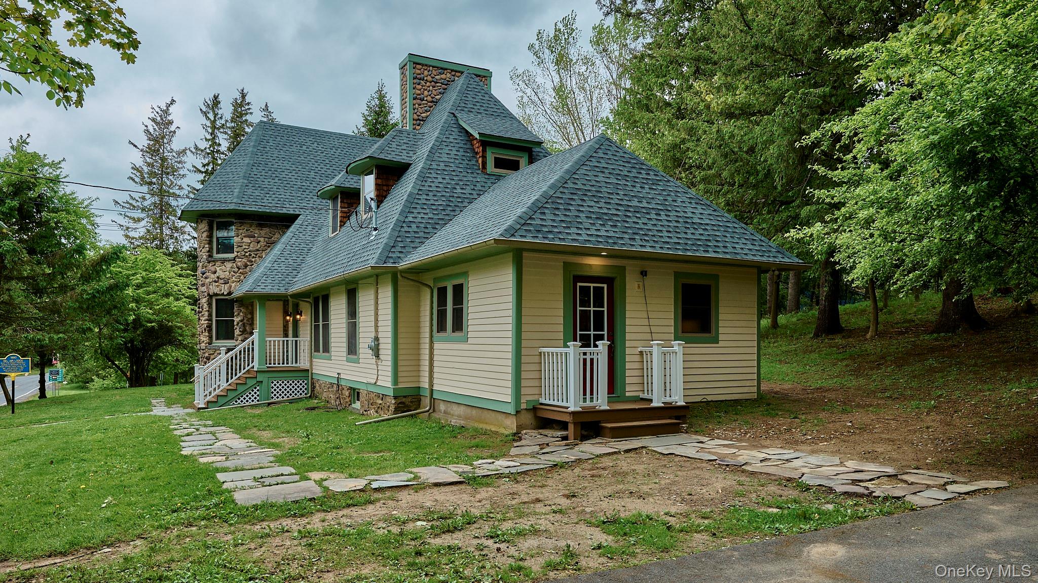 608 High Road Glen Spey, NY 12737 - Photo 8 of 37 a view of a house with a yard