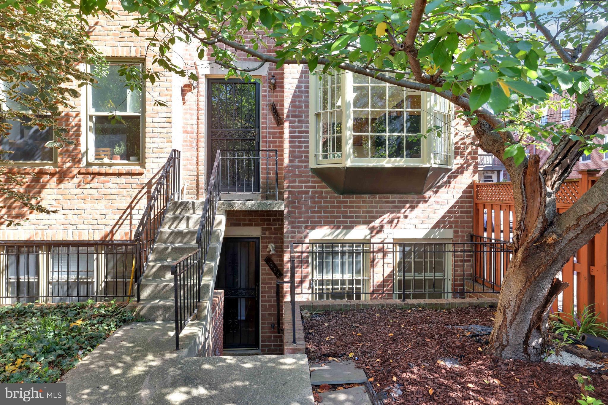 1649 Park Road Northwest Washington, DC 20010 - Photo 1 of 33 a view of a house with a tree front of house