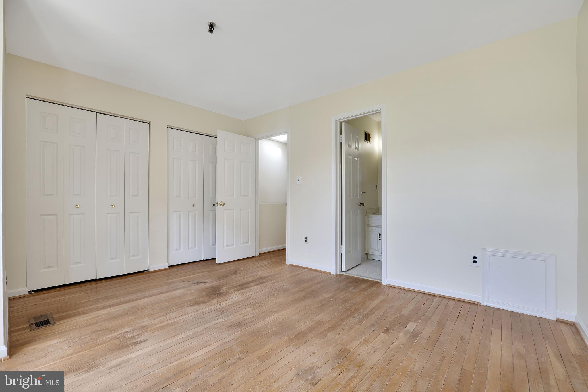 1649 Park Road Northwest Washington, DC 20010 - Photo 13 of 33 a view of an empty room with wooden floor