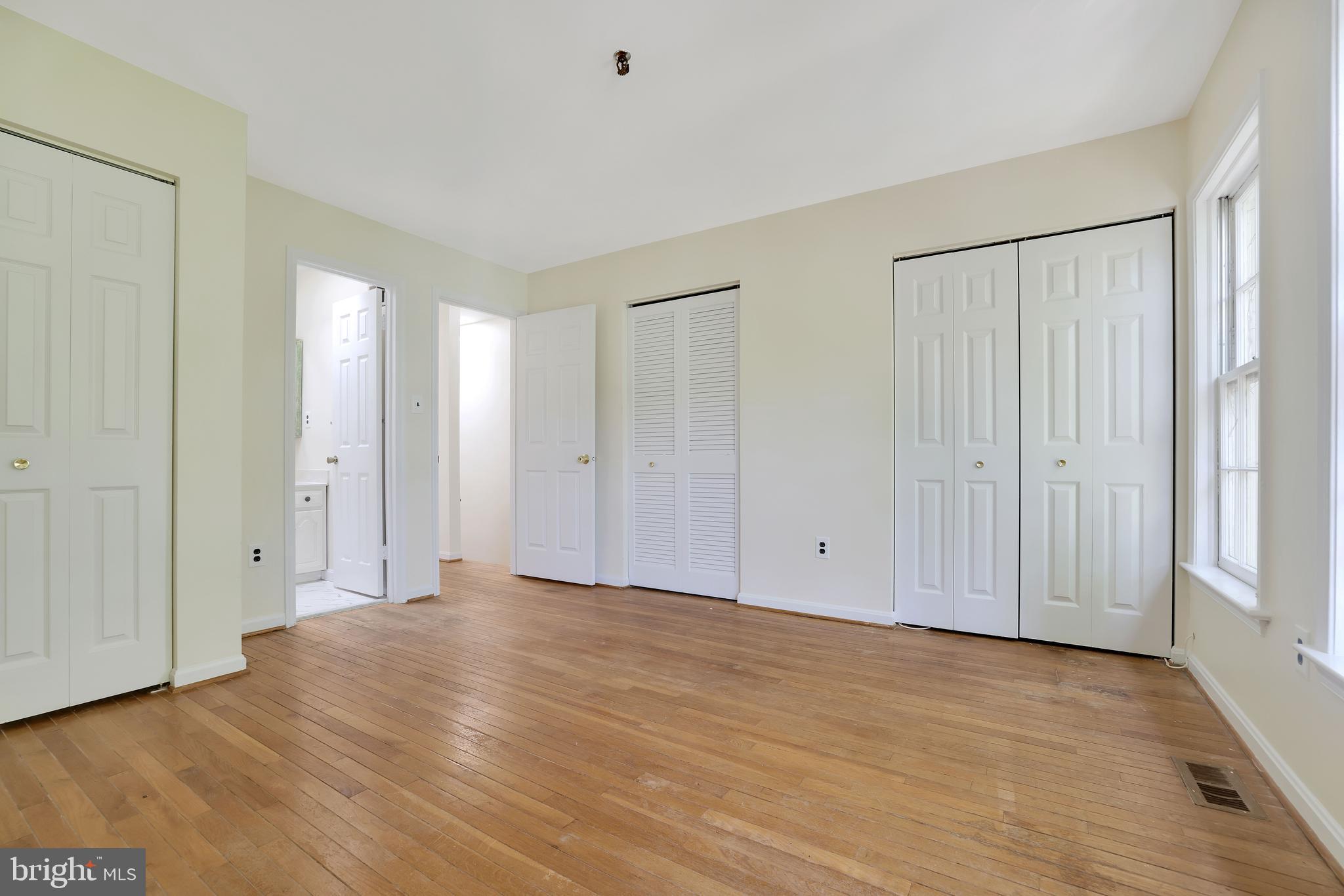 1649 Park Road Northwest Washington, DC 20010 - Photo 15 of 33 a view of an empty room with wooden floor