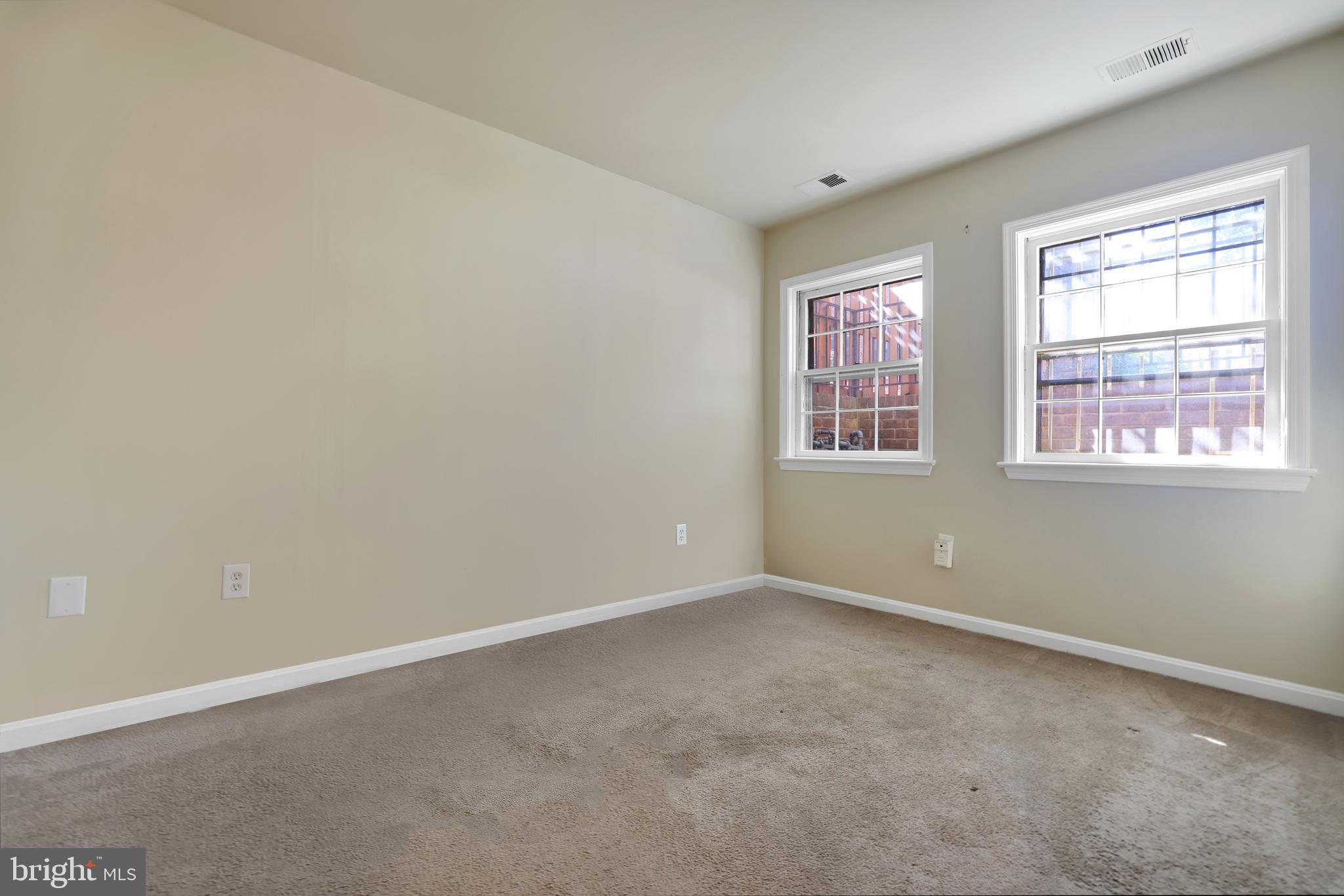 1649 Park Road Northwest Washington, DC 20010 - Photo 24 of 33 an empty room with windows