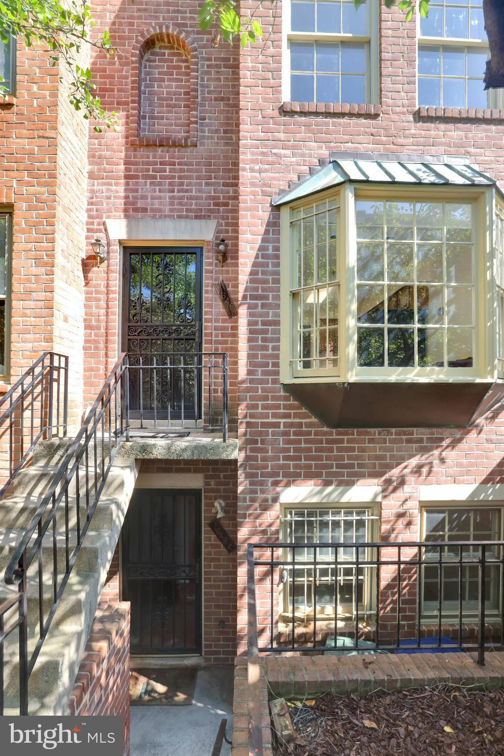 1649 Park Road Northwest Washington, DC 20010 - Photo 29 of 33 a front view of a house with large windows