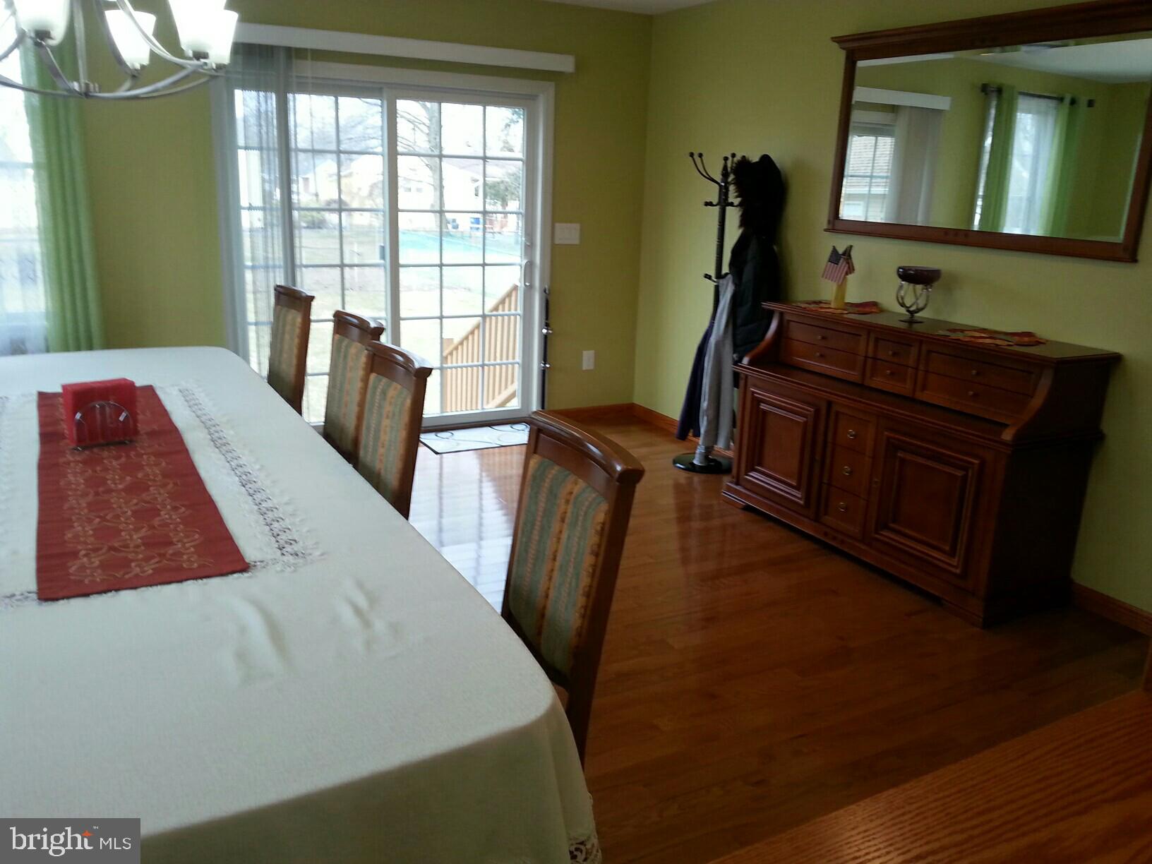 207 Dogwood Road Beverly, NJ 08010 - Photo 9 of 23 Sliding Door in Dining Room to Backyard