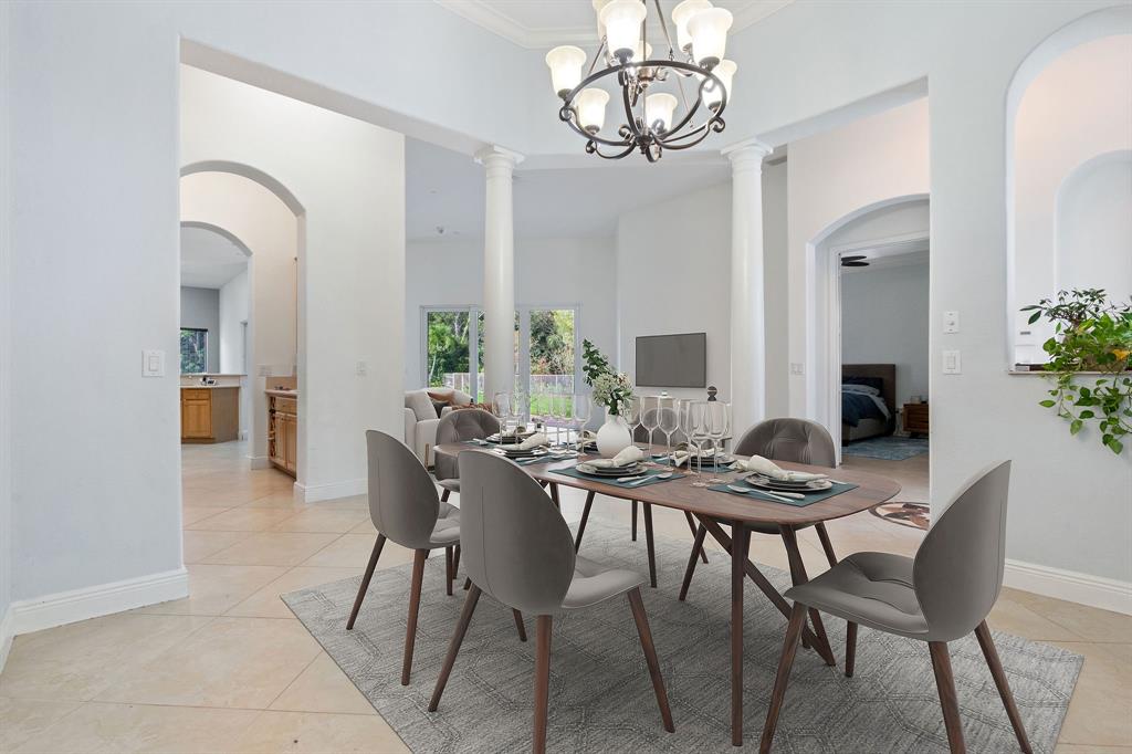 15651 Southwest 15th Street Davie, FL 33326 - Photo 13 of 47 a view of a dining room with furniture