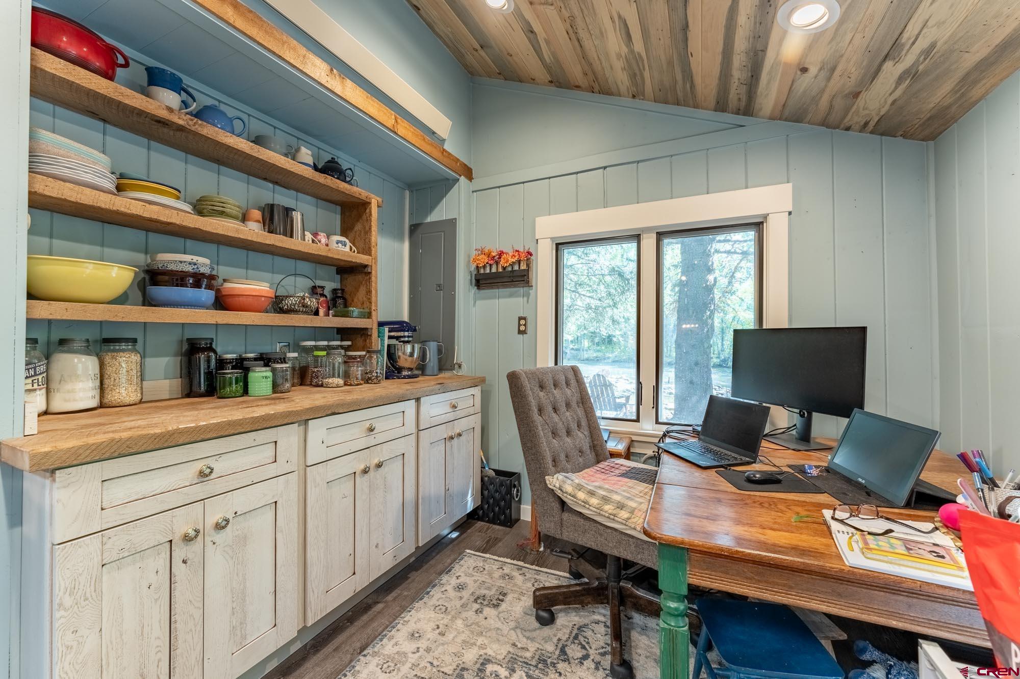 95 Deerpath Lane, Unit RIVERFRONT Almont, CO 81210 - Photo 21 of 35 a view of a workspace with furniture and a window